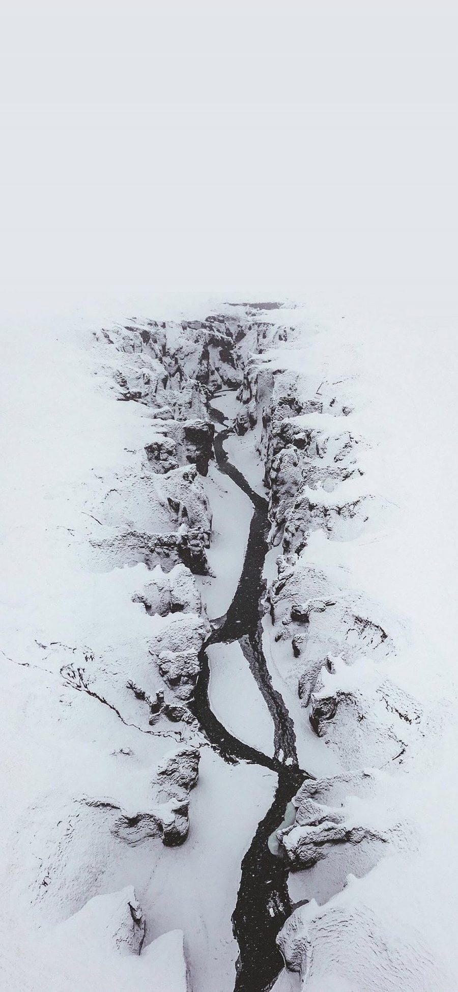 [2436×1125]俯拍 雪季 雪地 峡谷 苹果手机壁纸图片