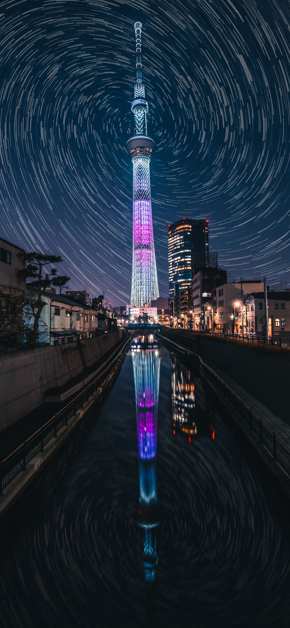[2436×1125]城市 夜景 建筑 天空 光圈 苹果手机壁纸图片