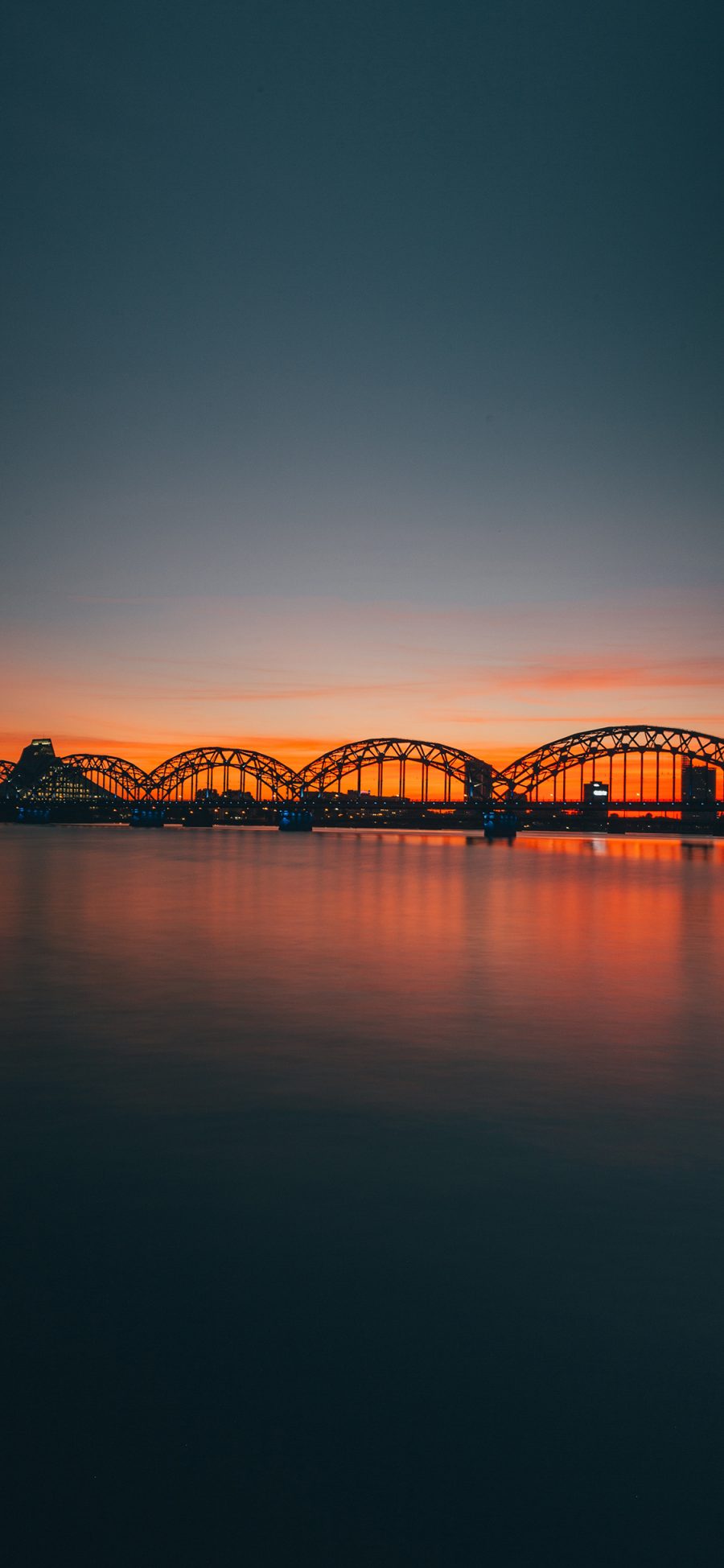 [2436×1125]夕阳 黄昏 桥梁 海平面 苹果手机壁纸图片
