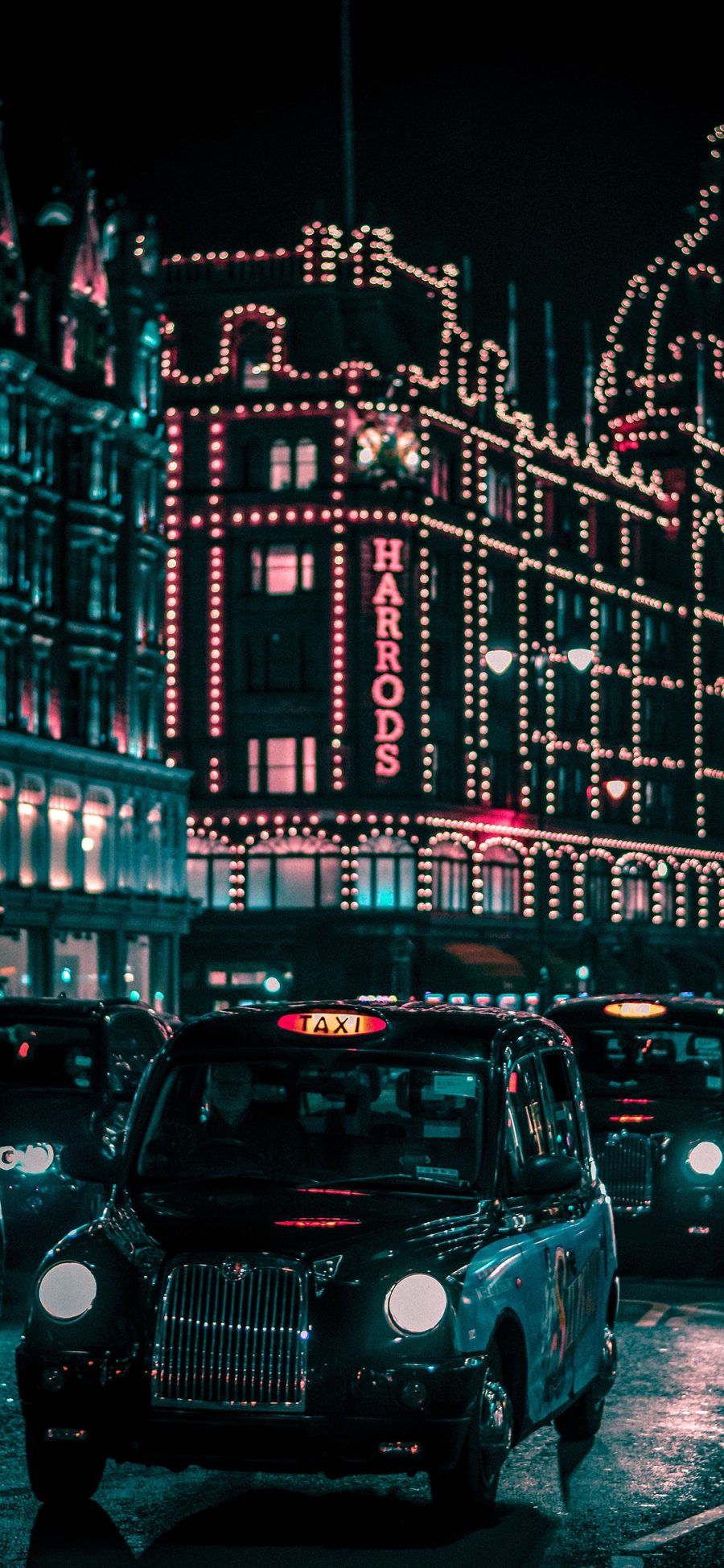 [2436×1125]夜景 城市 灯光 车辆 马路 建筑 苹果手机壁纸图片
