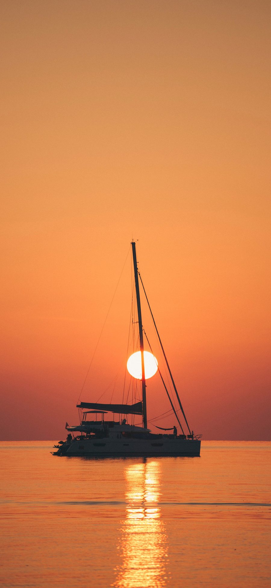 [2436×1125]大海 船只 夕阳 唯美 苹果手机壁纸图片