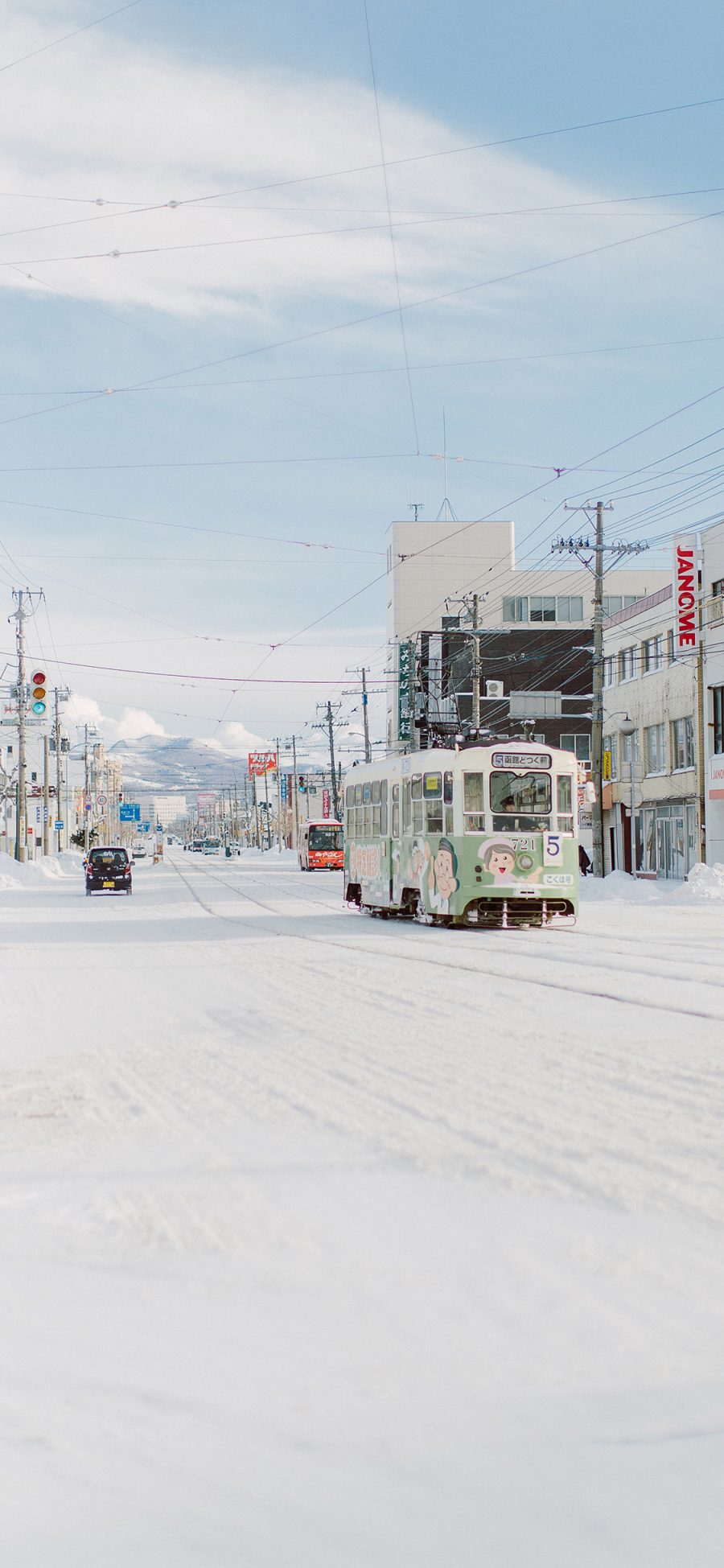 [2436×1125]日本 冬季 北海道 美景 巴士 苹果手机壁纸图片