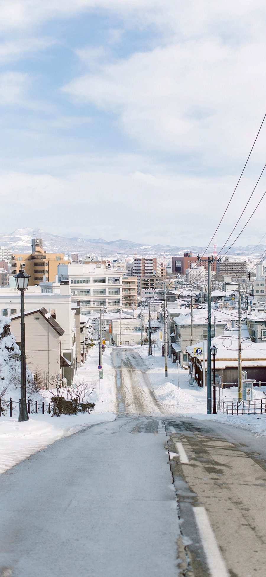 [2436×1125]日本 北海道 街景 白雪 苹果手机壁纸图片