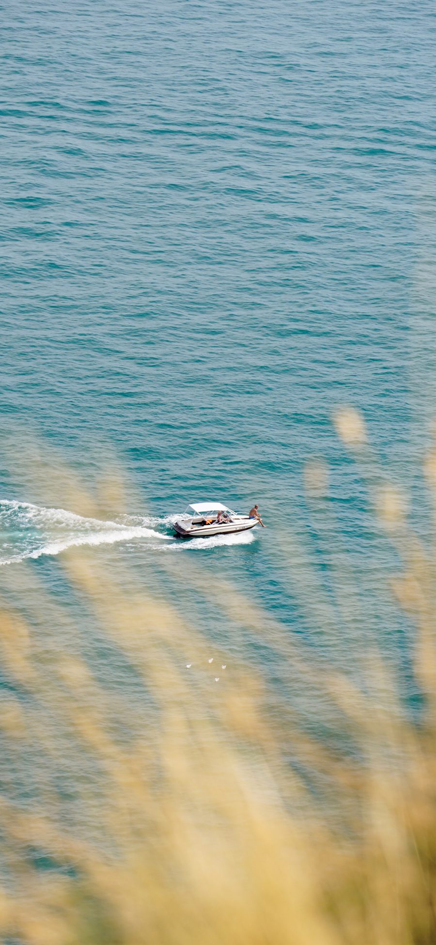 [2436×1125]海景 大海 船只 航行 苹果手机壁纸图片