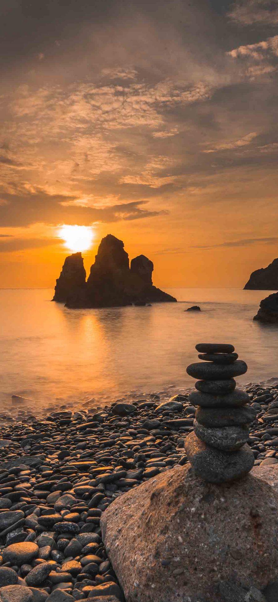 [2436×1125]海景 落日 石头 自然美景 苹果手机壁纸图片