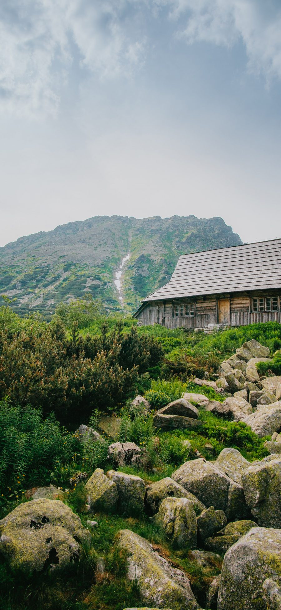 [2436×1125]石块 房屋 野外 天空 山区 苹果手机壁纸图片