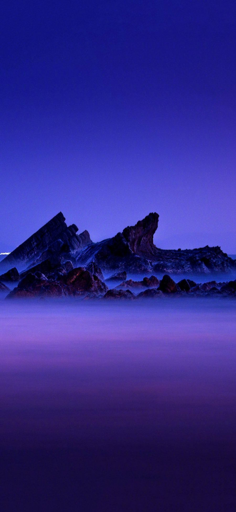 [2436×1125]礁石 紫色 渐变 大海 苹果手机壁纸图片