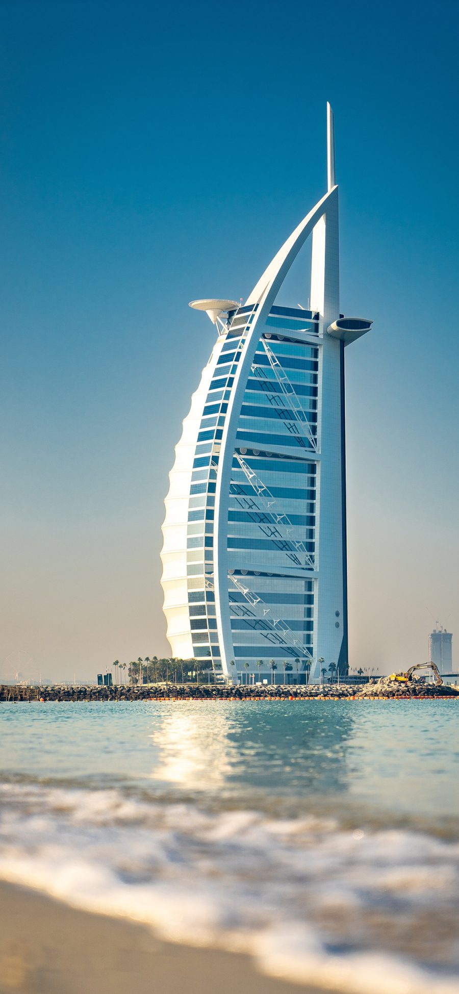 [2436×1125]迪拜 人工岛 海岸 帆船酒店 地标 苹果手机壁纸图片