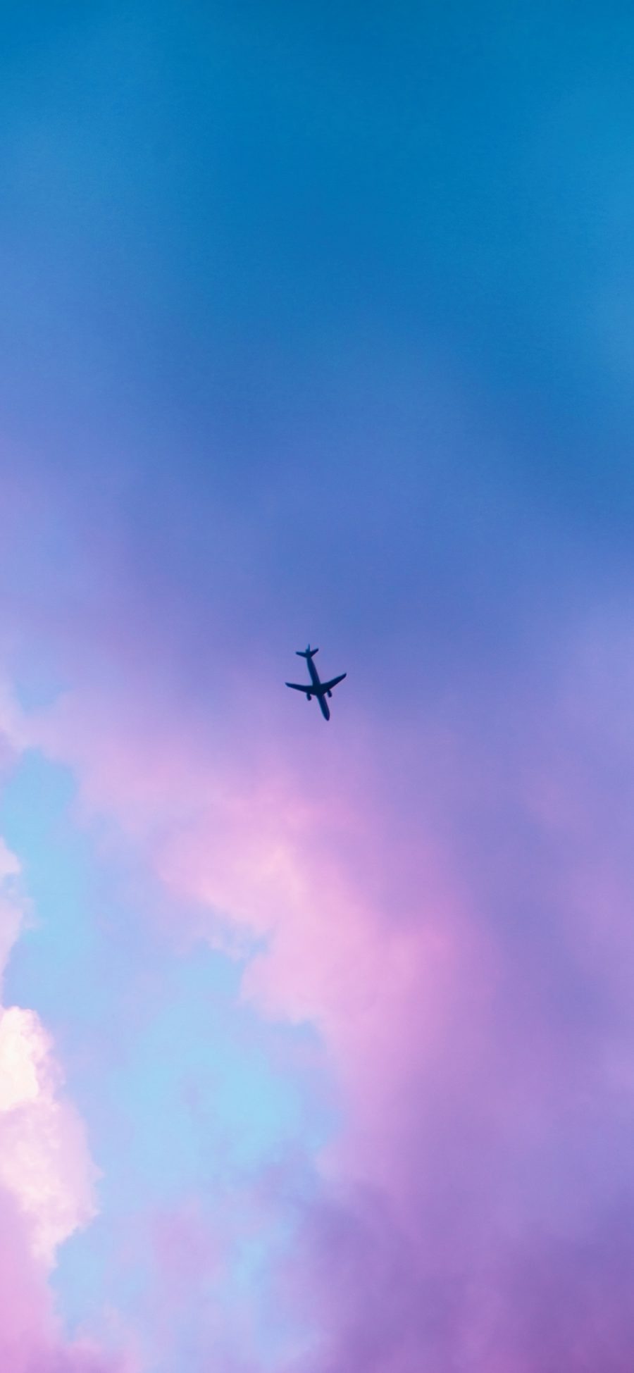 [2436×1125]飞机 飞行 天空 紫色 渐变 云彩 苹果手机壁纸图片